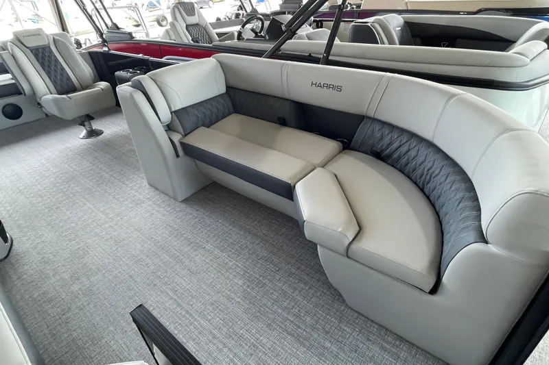 Slide: The Image of Luxurious interior of 2026 Harris Cruiser 230 pontoon boat with plush seating. - 5