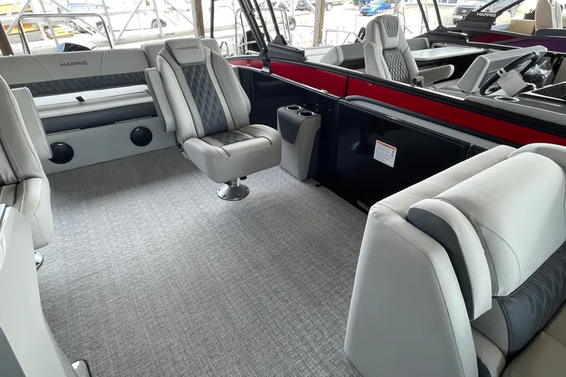 Slide: The Image of 2026 Harris Cruiser 230 interior with luxurious seating and modern design. - 7