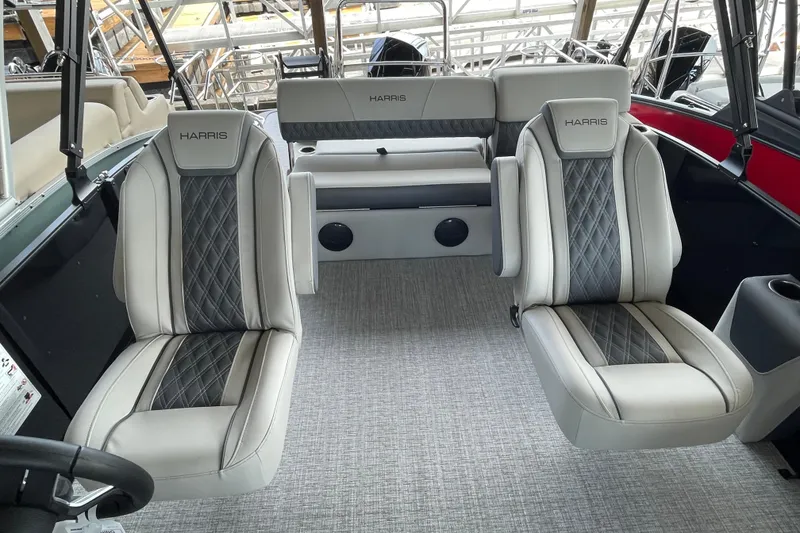 Slide: The Image of Interior of 2026 Harris Cruiser 230 boat with luxurious seating and modern design. - 9