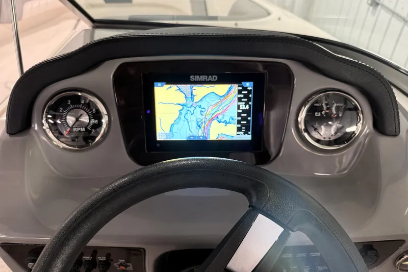 Slide: The Image of Dashboard of 2021 Chaparral 21 SSi boat with Simrad navigation display. - 22