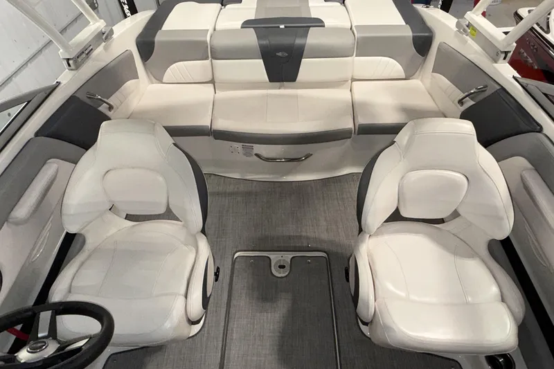 Slide: The Image of Interior of 2021 Chaparral 21 SSi boat with white seating and modern design. - 5