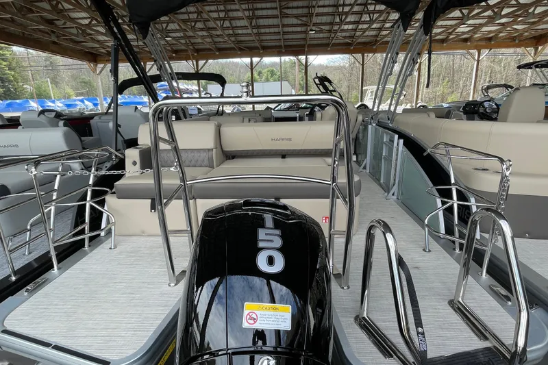 Slide: The Image of 2026 Harris Cruiser 230 pontoon boat with seating and 150 horsepower engine. - 18