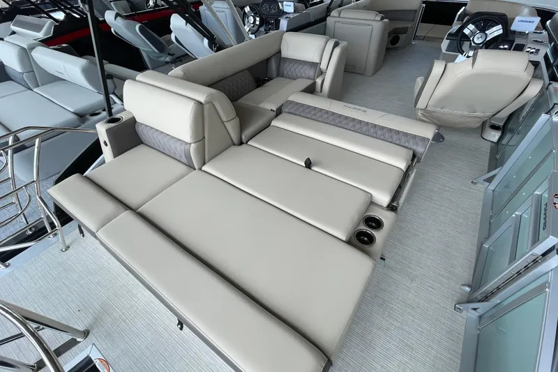 Slide: The Image of 2026 Harris Cruiser 230 interior with luxurious beige seating and modern design. - 20