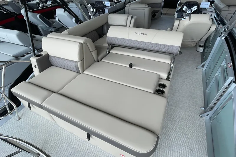 Slide: The Image of 2026 Harris Cruiser 230 boat interior with luxurious seating and modern design. - 21
