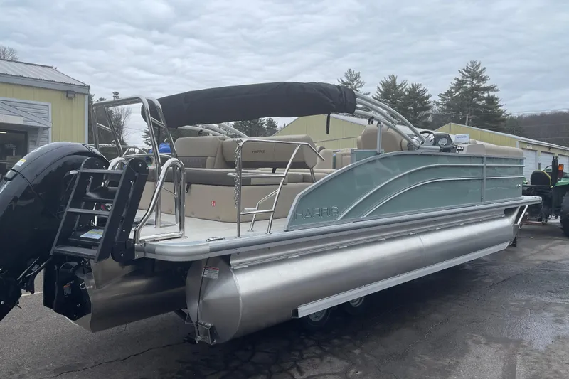 Slide: The Image of 2026 Harris Cruiser 230 pontoon boat with sleek design and modern features. - 3