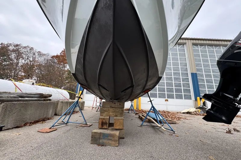 Slide: The Image of 2017 Parker 2810 XLD Walkaround boat docked at marina with overcast sky. - 10