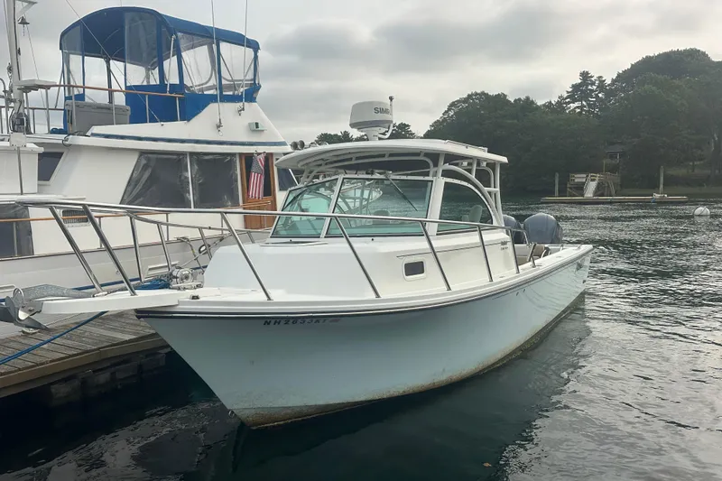 Slide: The Image of 2017 Parker 2810 XLD Walkaround with Simrad 4G radar at marina. - 12