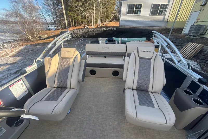 Slide: The Image of 2026 Harris Cruiser 230 boat interior with luxurious seating and modern design. - 3