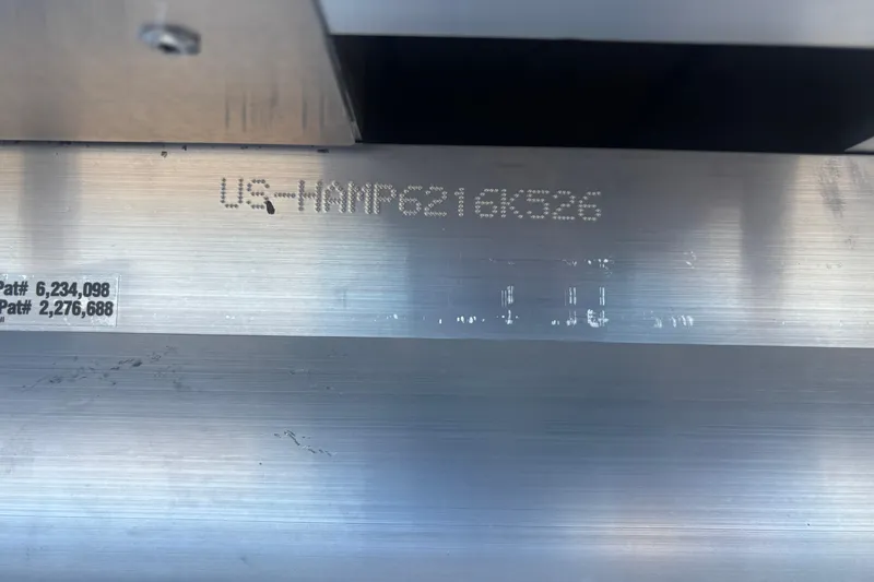 Slide: The Image of Harris Cruiser 230 (2026) hull identification number and patent details on metal surface. - 5