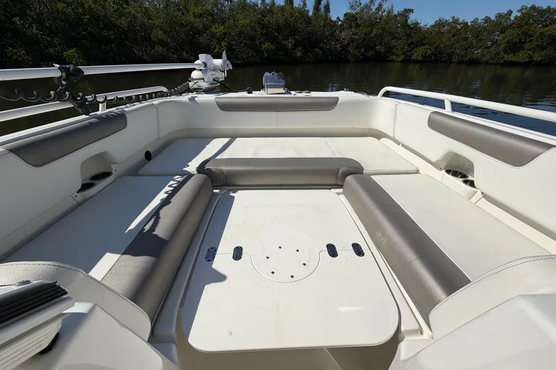 Slide: The Image of 2022 World Cat 255 DC boat interior with spacious seating and sleek design. - 10
