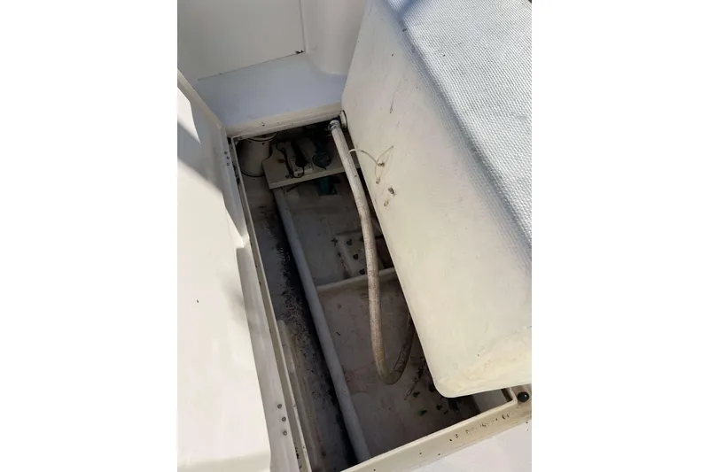 Slide: The Image of Open storage compartment on 2003 Henriques Yachts 35 Sportfisherman boat. - 10