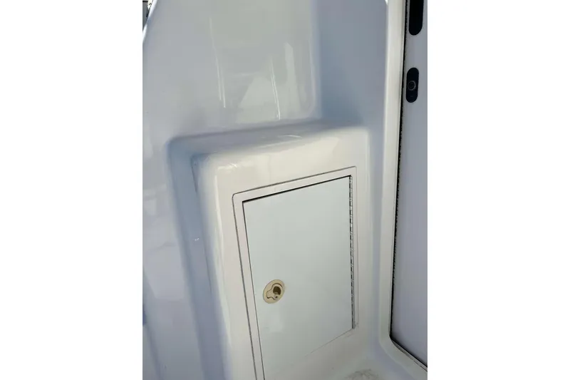 Slide: The Image of 2003 Henriques Yachts 35 Sportfisherman, white storage compartment detail. - 21