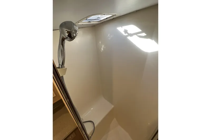 Slide: The Image of Shower area in 2003 Henriques Yachts 35 Sportfisherman, featuring a handheld showerhead. - 47
