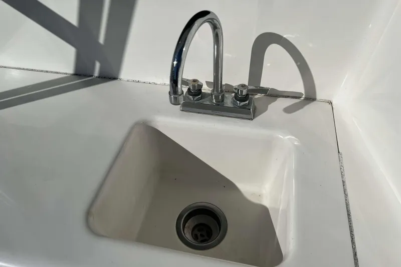 Slide: The Image of Sink with chrome faucet on 2003 Henriques Yachts 35 Sportfisherman. - 6
