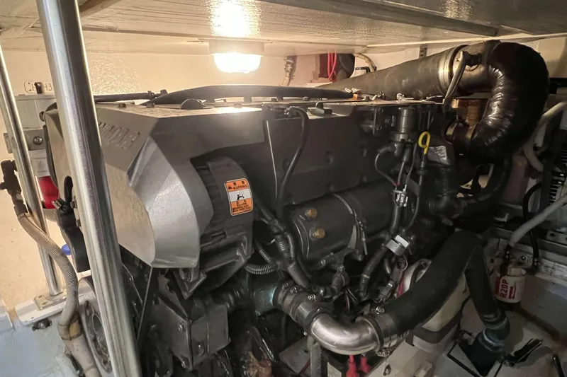 Slide: The Image of Engine room of a 2003 Henriques Yachts 35 Sportfisherman, showcasing detailed machinery. - 71
