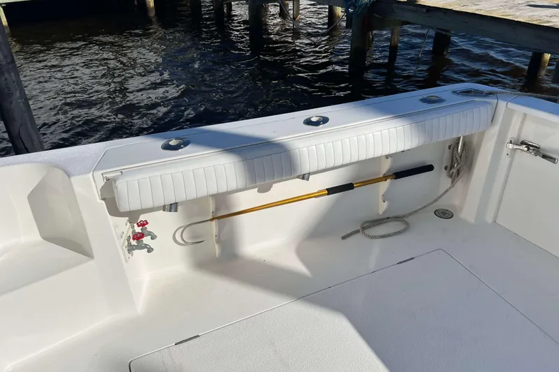 Slide: The Image of 2003 Henriques Yachts 35 Sportfisherman deck with fishing rod holder and water access. - 8