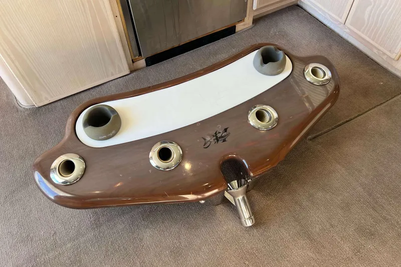 Slide: The Image of 2003 Henriques Yachts 35 Sportfisherman interior with rod holders and cup holders. - 81