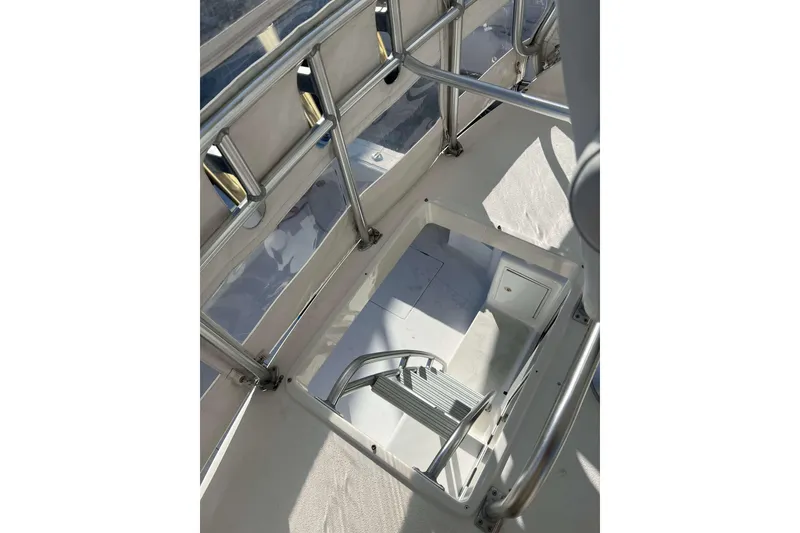 Slide: The Image of 2003 Henriques Yachts 35 Sportfisherman interior with ladder and railing details. - 83