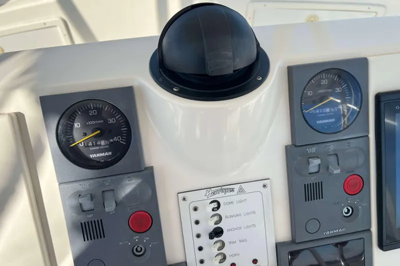 Slide: The Image of Control panel of a 2003 Henriques Yachts 35 Sportfisherman with Yanmar engine gauges. - 89