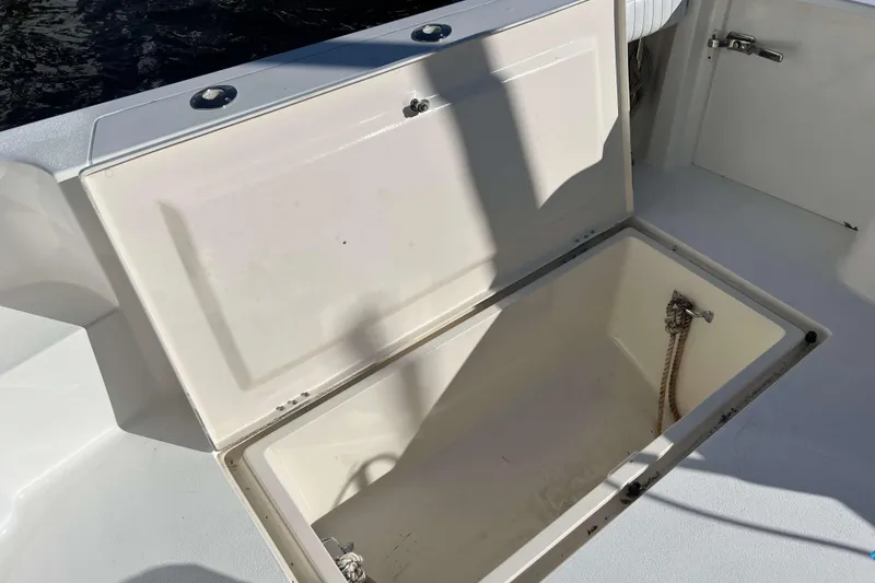 Slide: The Image of Open storage compartment on 2003 Henriques Yachts 35 Sportfisherman boat deck. - 9