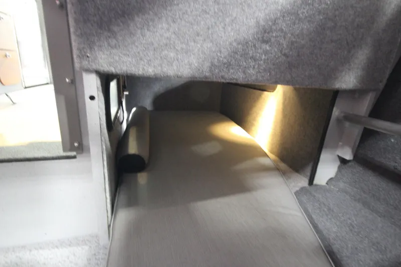 Slide: The Image of Interior cabin view of 2025 Weldcraft 300 Cuddy King OS boat, featuring cozy sleeping area. - 40