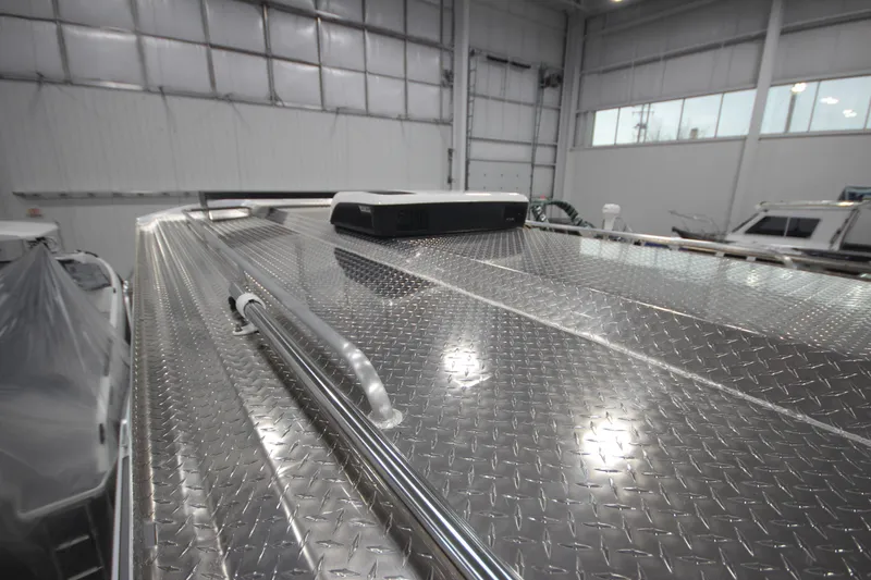 Slide: The Image of Rooftop view of 2025 Weldcraft 300 Cuddy King OS with diamond plate finish. - 43