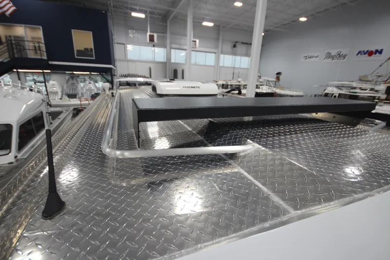 Slide: The Image of Rooftop view of 2025 Weldcraft 300 Cuddy King OS with diamond plate finish. - 44