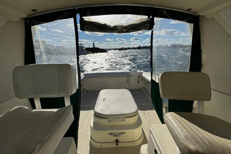 Slide: The Image of Interior view of 1999 Albin 28 Tournament Express boat with ocean backdrop. - 5