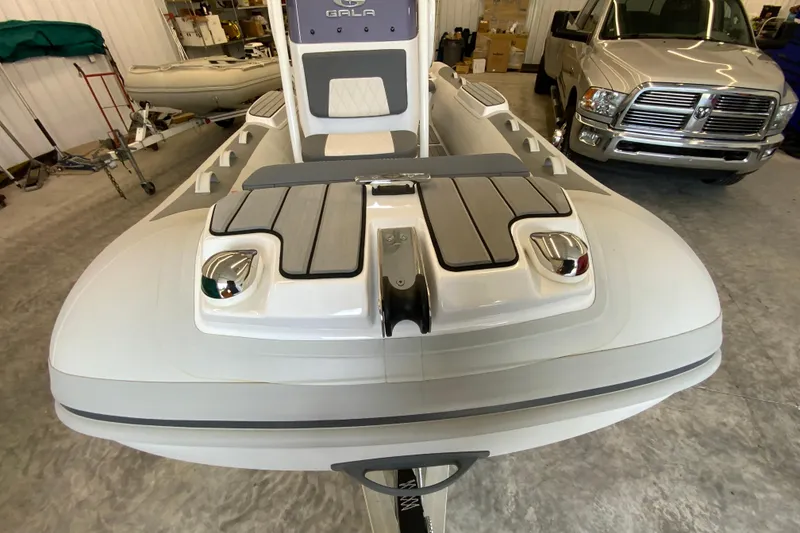 Slide: The Image of 2026 Gala V500 boat in a garage, featuring sleek design and modern detailing. - 17