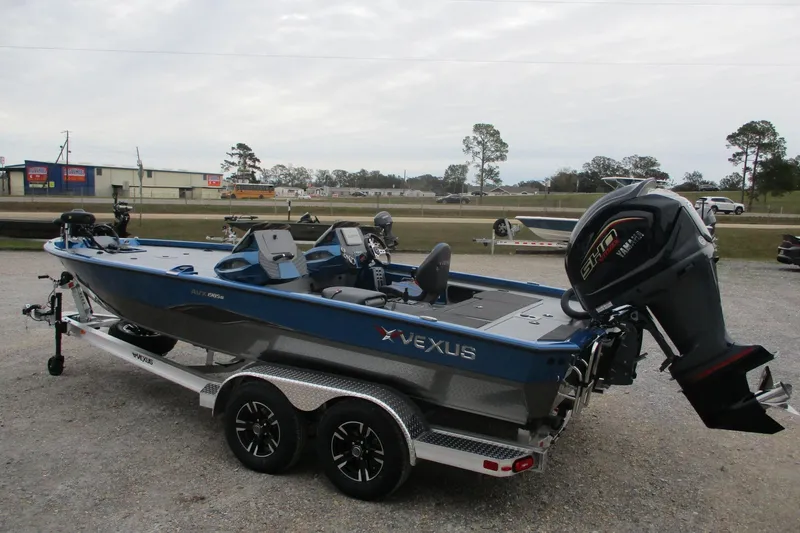Slide: The Image of 2026 Vexus AVX1985S boat on trailer, featuring sleek design and powerful outboard motor. - 1