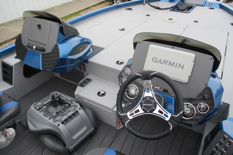 Slide: The Image of 2026 Vexus AVX1985S boat interior with Garmin navigation system and modern steering console. - 10