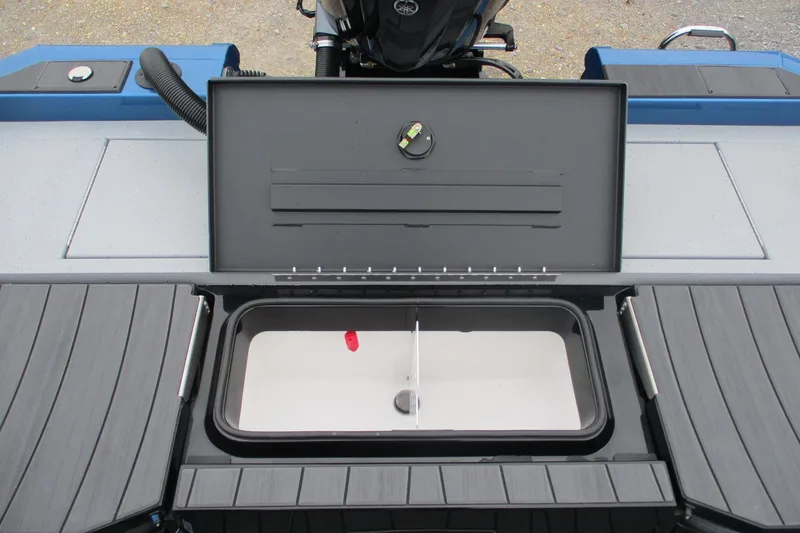 Slide: The Image of 2026 Vexus AVX1985S boat livewell compartment with open lid, showcasing interior design. - 16