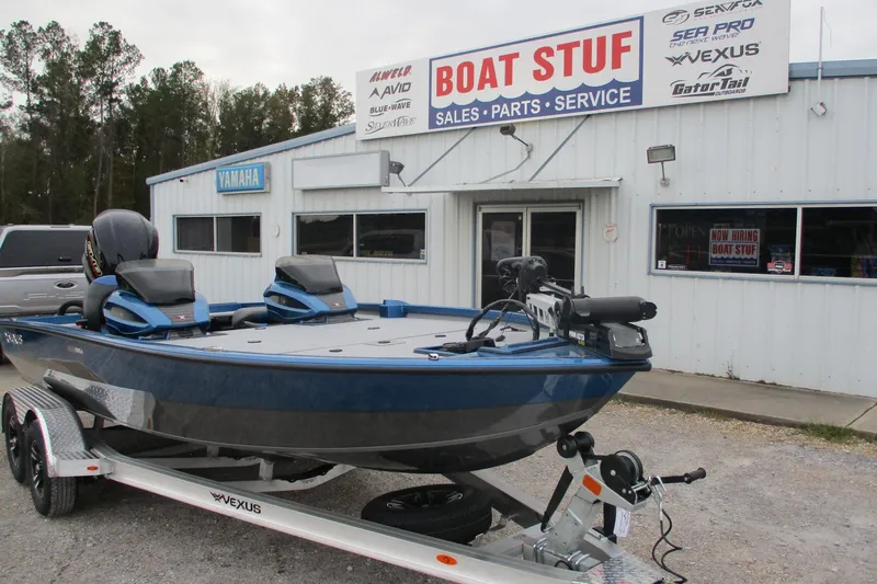 Slide: The Image of 2026 Vexus AVX1985S boat on trailer outside Boat Stuf sales and service shop. - 2