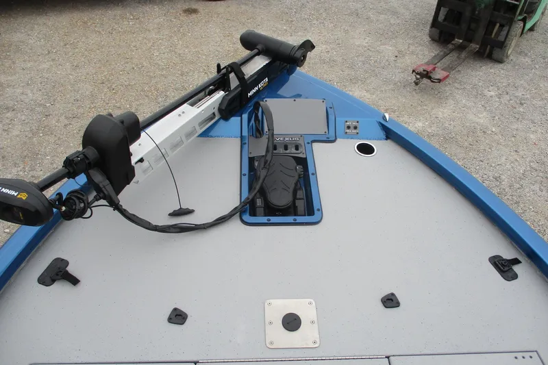 Slide: The Image of 2026 Vexus AVX1985S boat deck with Minn Kota trolling motor, blue trim. - 8