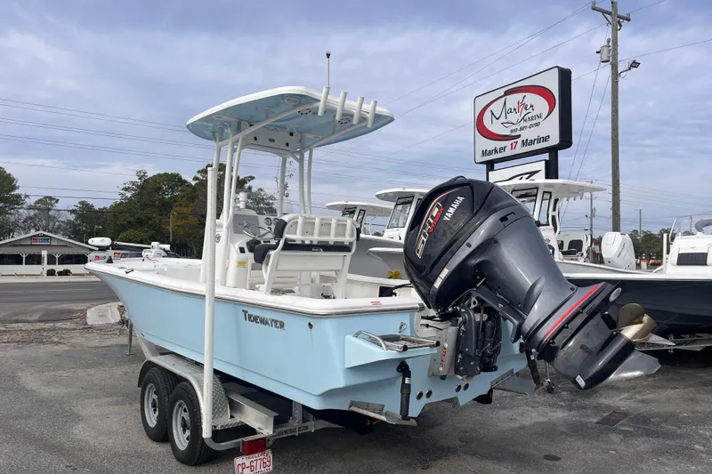 Slide: The Image of 2023 Tidewater 2210 Carolina Bay boat with Yamaha engine at Marker 17 Marine dealership. - 2