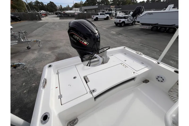 Slide: The Image of 2023 Tidewater 2210 Carolina Bay boat with Yamaha engine in a dealership lot. - 5