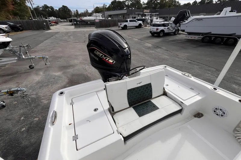 Slide: The Image of 2023 Tidewater 2210 Carolina Bay boat with Yamaha engine in a dealership lot. - 6