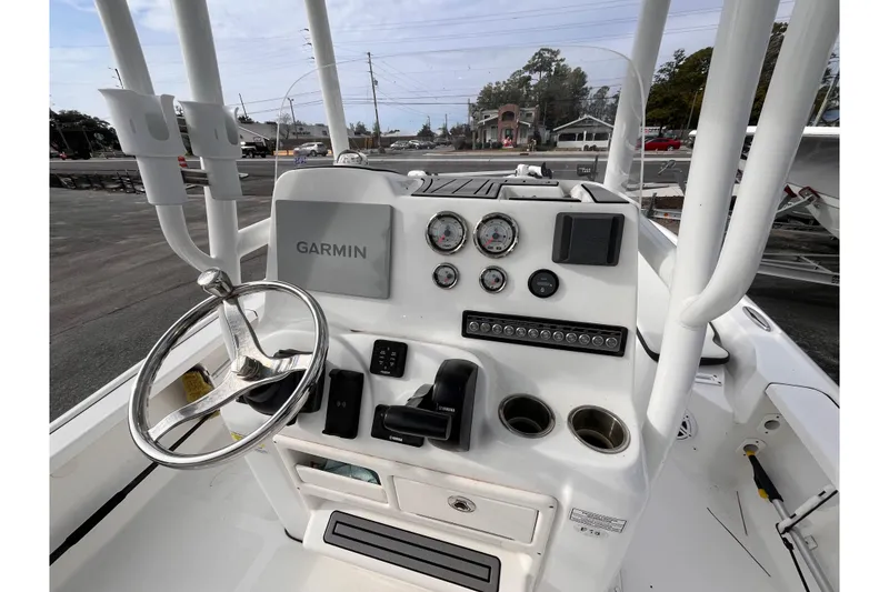 Slide: The Image of 2023 Tidewater 2210 Carolina Bay boat dashboard with Garmin navigation system. - 8