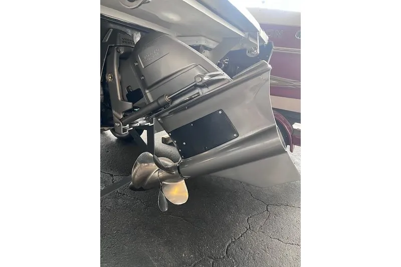 Slide: The Image of 2025 Cobalt CS23 Surf boat propeller and drive system close-up. - 24