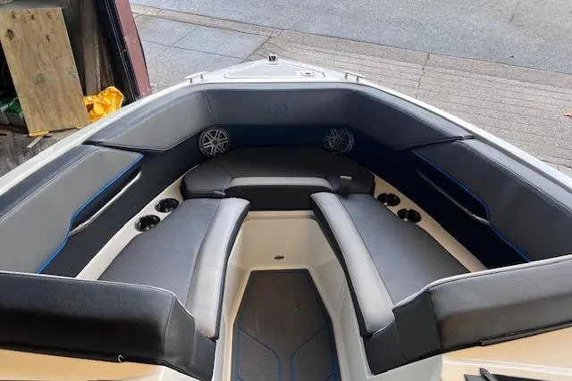 Slide: The Image of 2025 Cobalt CS23 Surf boat interior with sleek seating and modern design. - 3