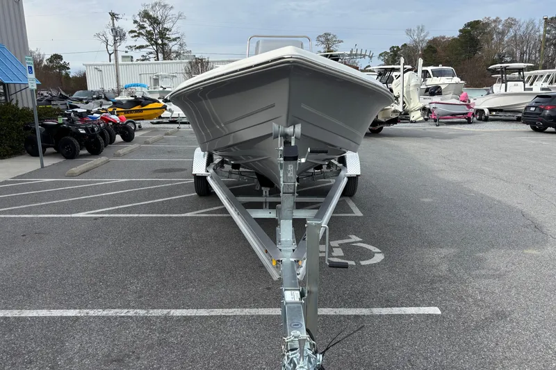 Slide: The Image of Front view of a 2026 Bulls Bay 2000 boat on a trailer in a parking lot. - 2