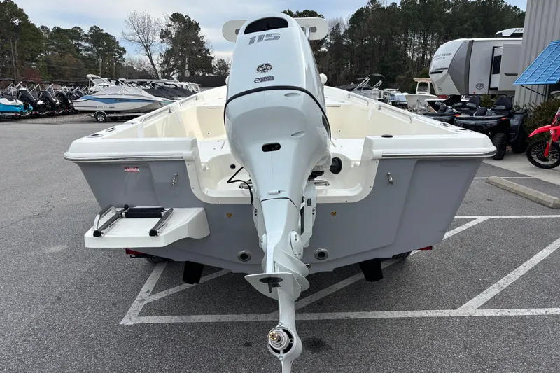 Slide: The Image of 2026 Bulls Bay 2000 boat with outboard motor in a dealership lot. - 6