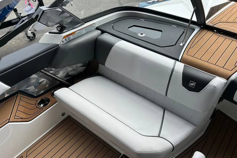 Slide: The Image of 2019 Nautique Ski Nautique interior with sleek seating and modern design elements. - 12