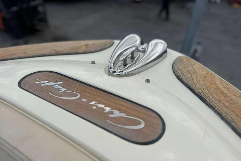 Slide: The Image of 2018 Chris-Craft Launch 23 boat detail with wood accents and chrome fittings. - 13