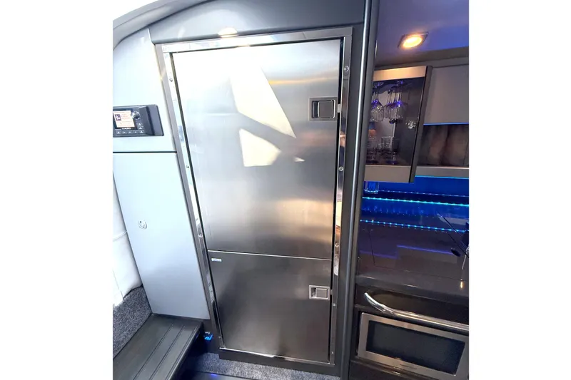 Slide: The Image of Interior of 2015 Formula 400 Super Sport yacht with sleek stainless steel fridge. - 20