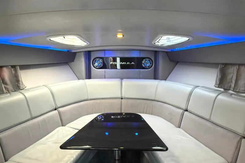 Slide: The Image of Luxurious interior of 2015 Formula 400 Super Sport yacht with sleek seating and ambient lighting. - 24