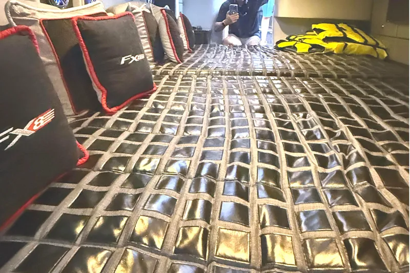 Slide: The Image of Interior cabin of 2015 Formula 400 Super Sport with luxury bedding and cushions. - 31