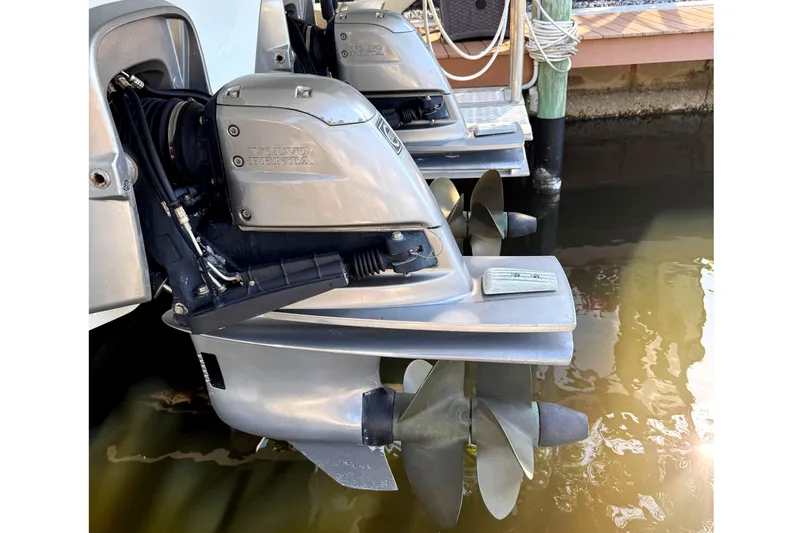 Slide: The Image of 2015 Formula 400 Super Sport boat engines docked in water. - 37
