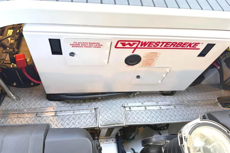 Slide: The Image of Engine compartment of a 2015 Formula 400 Super Sport with Westerbeke generator. - 38