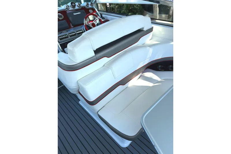 Slide: The Image of Luxurious interior of 2015 Formula 400 Super Sport boat with white seating and red accents. - 8
